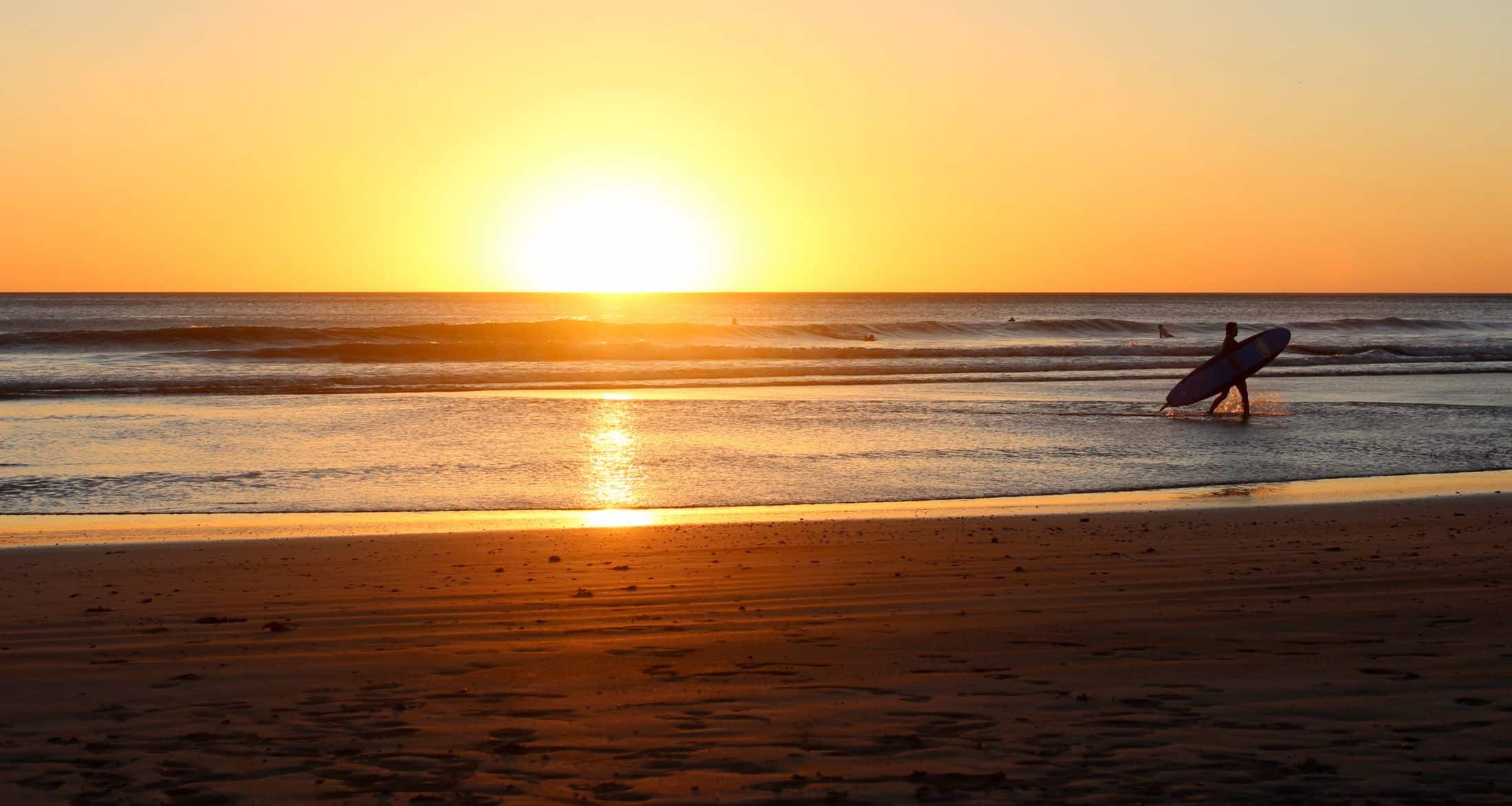 Read more about the article First Time Surfing?  Here’s Your Guide to Having a Blast