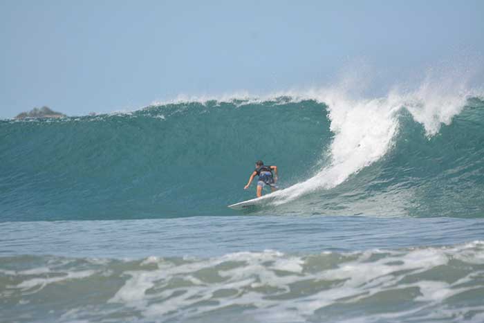 Dropping into a bomb at Playa Grande, Costa Rica